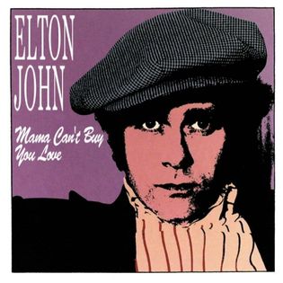 Elton John » Mama Can’t Buy You Love Lyrics